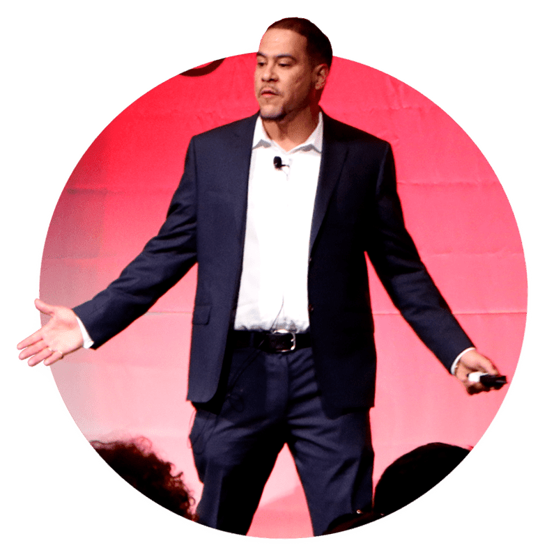 Ricky Mataka speaking on stage
